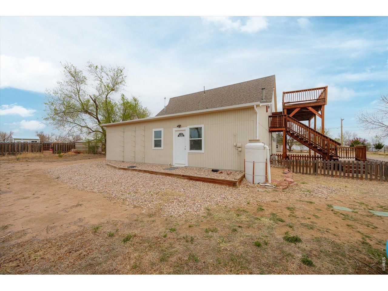 1019 3rd Street Pierce, CO 80650 - Photo 7 of 37 a view of a house with a snow in the yard