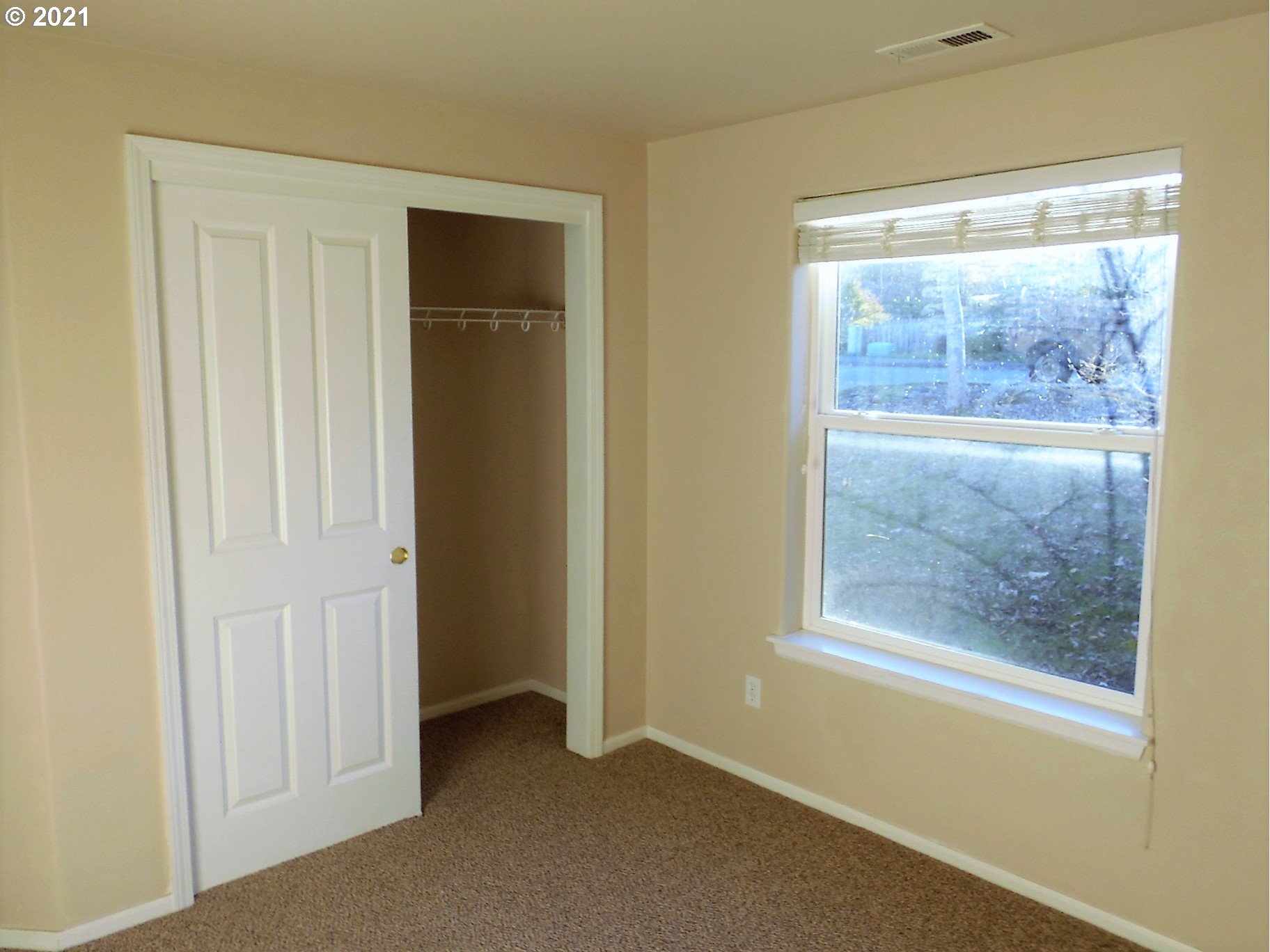 185 Lebleu Lane Winston, OR 97496 - Photo 12 of 23 a view of an empty room with a window