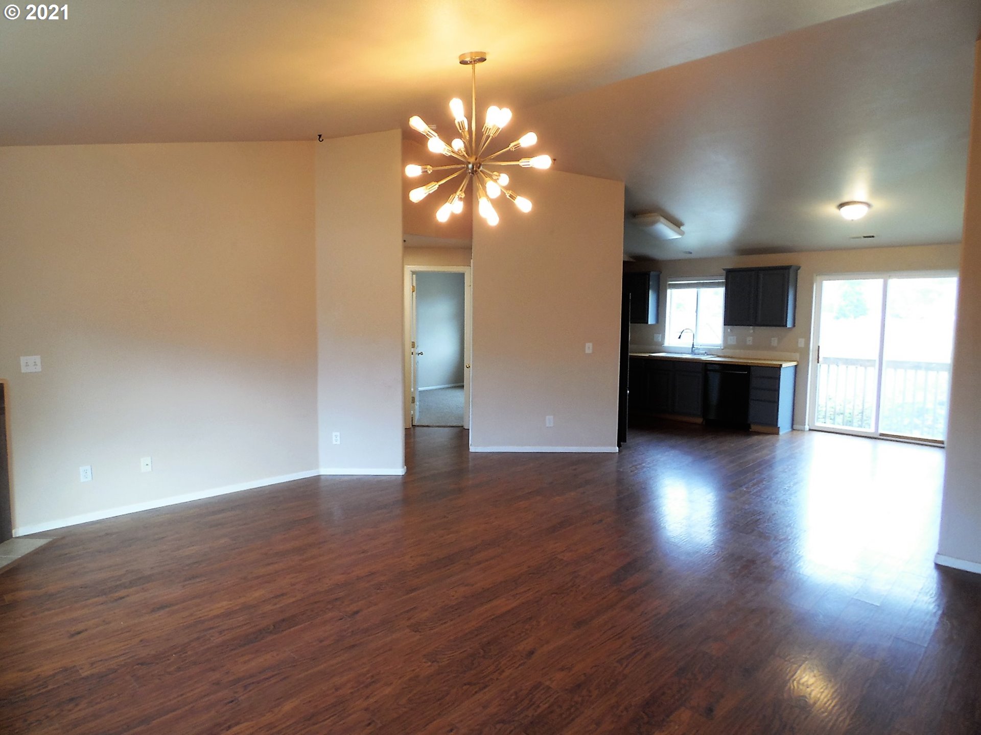 185 Lebleu Lane Winston, OR 97496 - Photo 5 of 23 a view of a room with wooden floor and kitchen