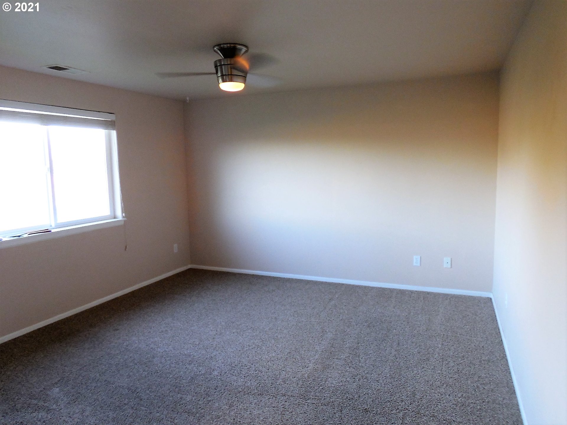 185 Lebleu Lane Winston, OR 97496 - Photo 9 of 23 an empty room with a window