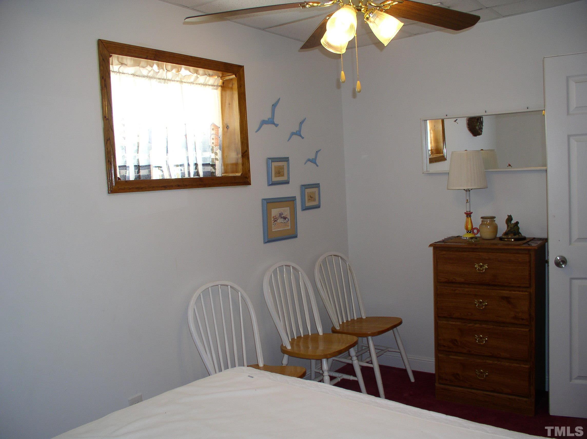 64 Fish Trail Bracey, VA 23919 - Photo 30 of 39 a view of a workspace with furniture and a window