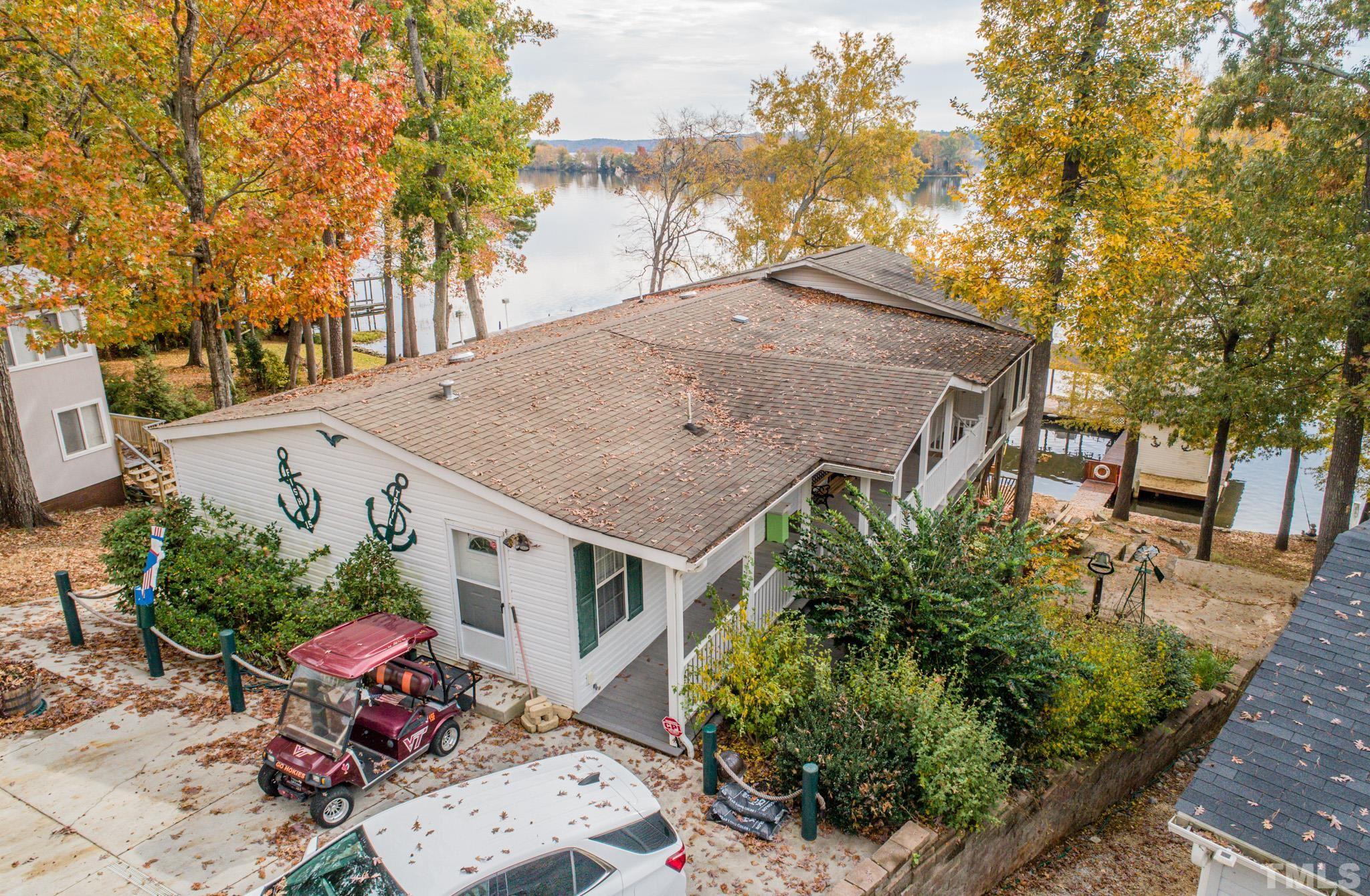 64 Fish Trail Bracey, VA 23919 - Photo 3 of 39 an aerial view of a house with a yard and potted plants