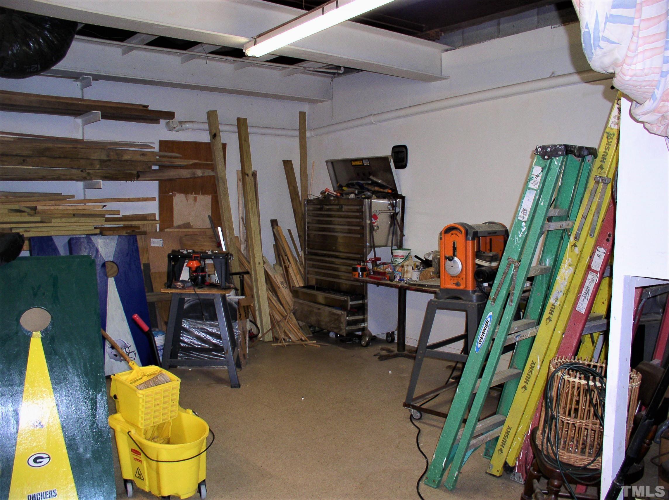 64 Fish Trail Bracey, VA 23919 - Photo 33 of 39 a view of a room with gym equipment