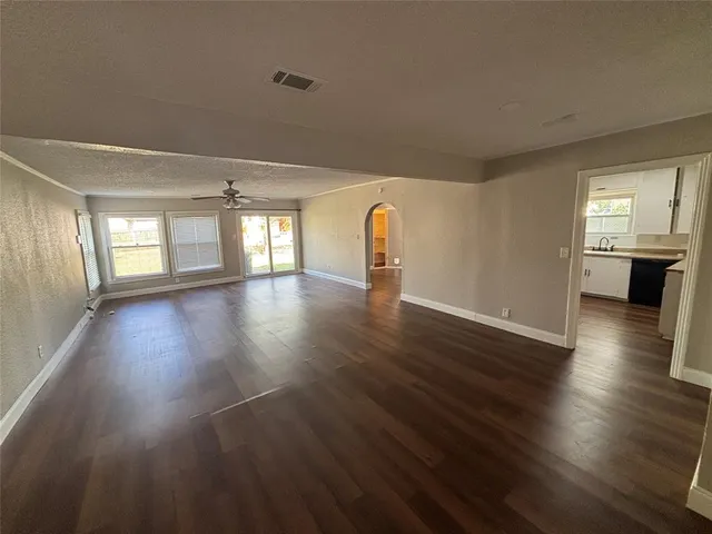 a view of a livingroom with wooden floor
