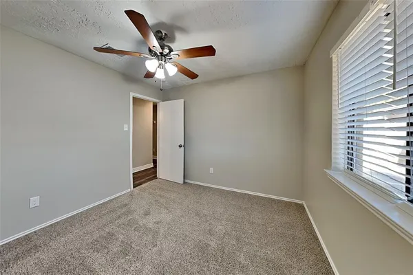 en view of an empty room with a window