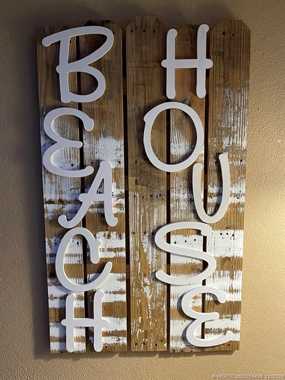 513 Gunwale Lane Longboat Key, FL 34228 - Photo 2 of 59 a bathroom with a toilet and a mirror