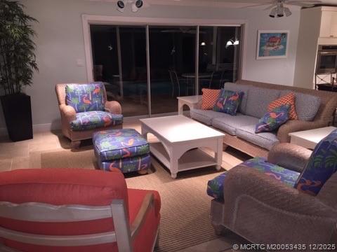 513 Gunwale Lane Longboat Key, FL 34228 - Photo 36 of 59 a living room with furniture and a large window