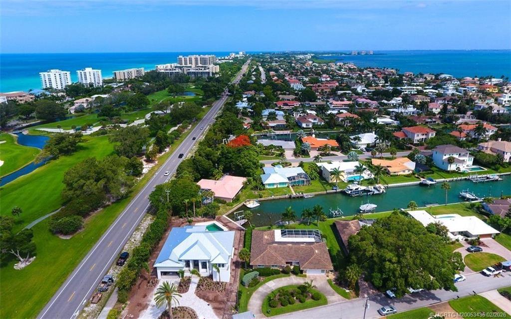 513 Gunwale Lane Longboat Key, FL 34228 - Photo 4 of 61 an aerial view of residential houses with outdoor space and swimming pool