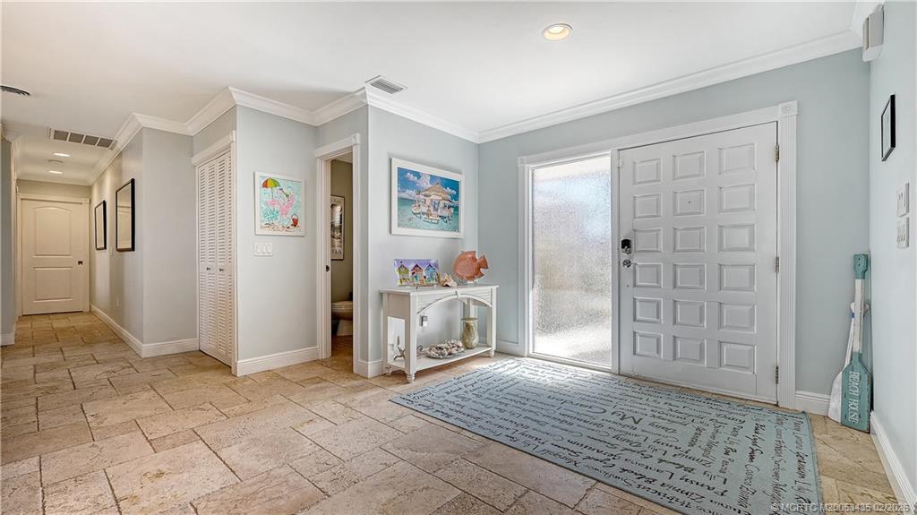 513 Gunwale Lane Longboat Key, FL 34228 - Photo 5 of 61 a view of a livingroom with wooden floor and a bathroom