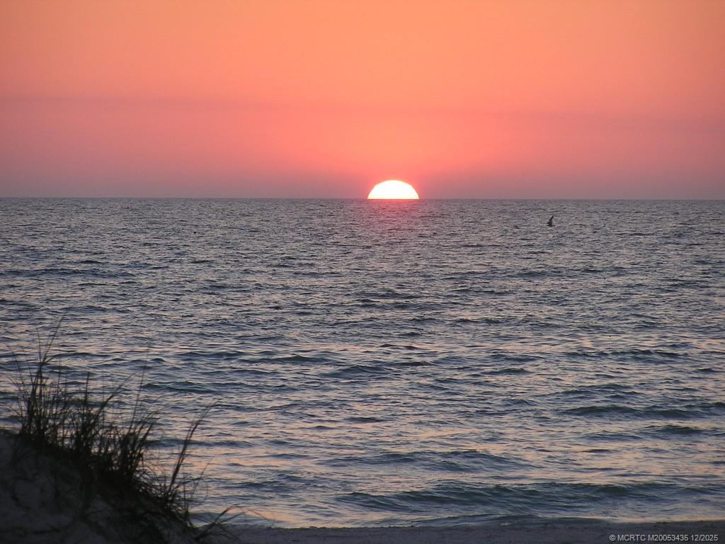 513 Gunwale Lane Longboat Key, FL 34228 - Photo 53 of 59 a view of ocean with a building