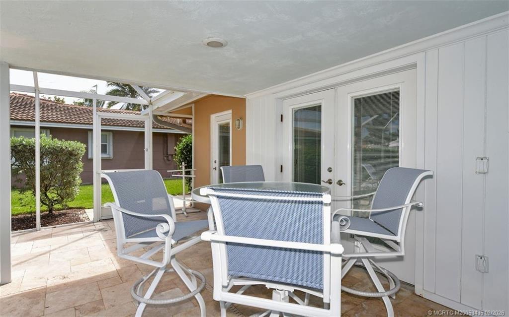 513 Gunwale Lane Longboat Key, FL 34228 - Photo 58 of 61 a view of a dining room with furniture window and outside view