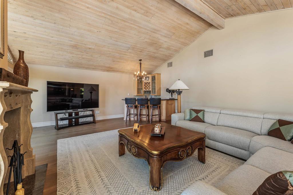 16346 Via Del Alba Rancho Santa Fe, CA 92067 - Photo 11 of 34 a living room with furniture and a flat screen tv