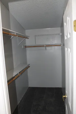 a view of storage and utility room with washer and dryer