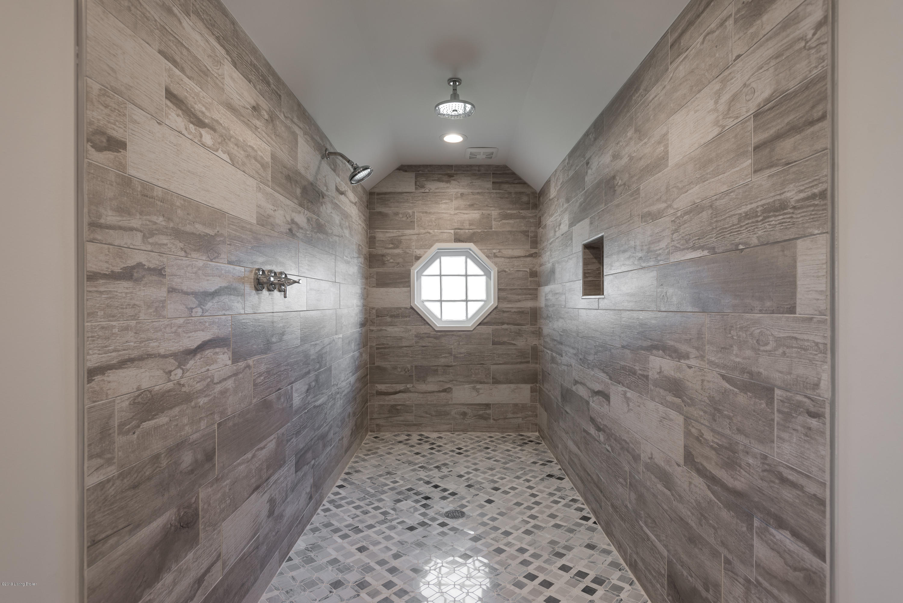 3110 Sherbrooke Road Louisville, KY 40205 - Photo 39 of 69 Luxurious en suite master bath features a spacious, tiled walk-in shower with overhead rainshower