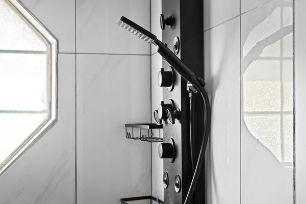 a en suite bathroom with a double vanity sink and a mirror