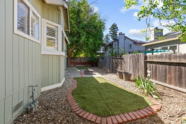 a front view of a house with yard