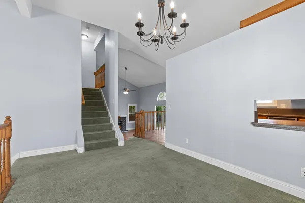 a view of a hallway with entryway