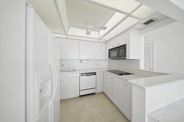 a view of balcony with furniture