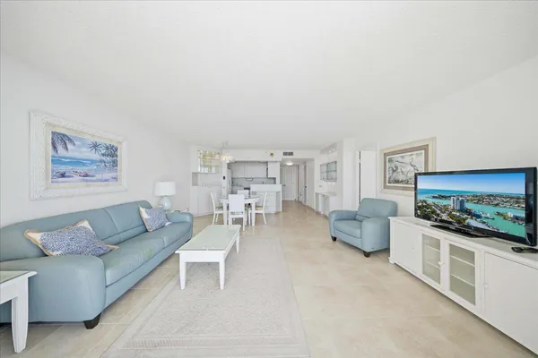 a kitchen with a sink stove and microwave