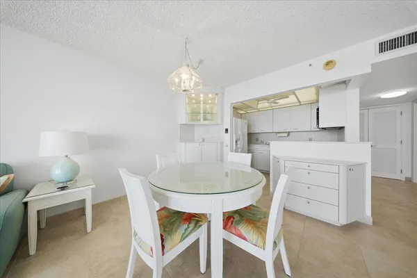 a view of a balcony with wooden floor