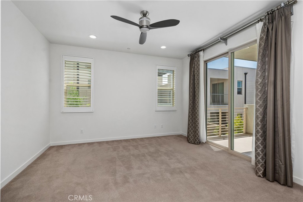 112 Menkar Irvine, CA 92618 - Photo 17 of 54 an empty room with windows and fan