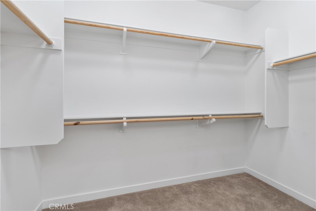 112 Menkar Irvine, CA 92618 - Photo 20 of 54 a view of a room with shelf on the wall