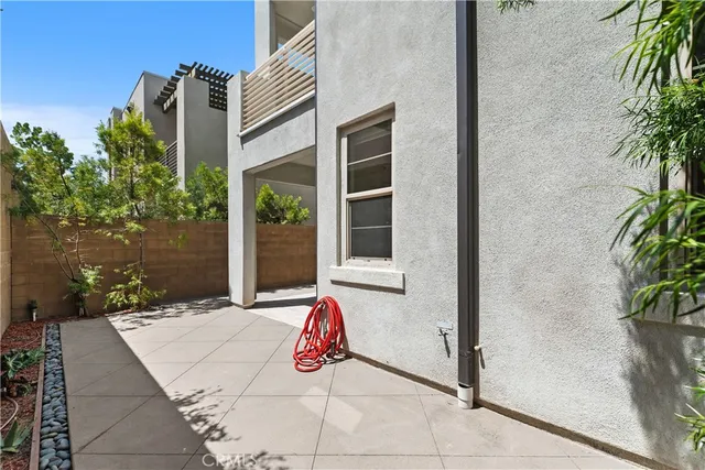 a view of a chairs and tables in the balcony