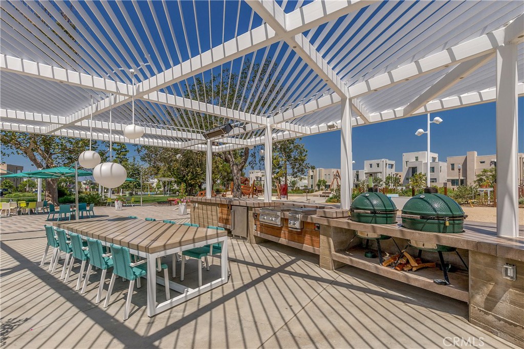112 Menkar Irvine, CA 92618 - Photo 37 of 54 a view of a chairs and tables in the balcony