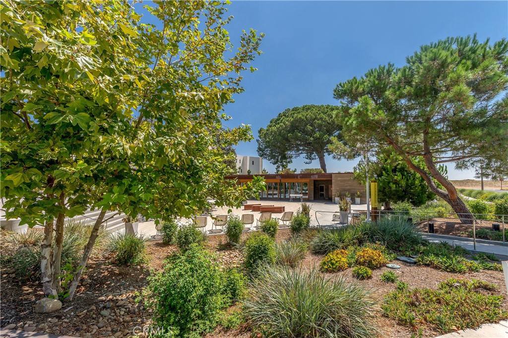 112 Menkar Irvine, CA 92618 - Photo 41 of 54 a backyard of a house with lots of green space