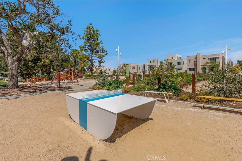 112 Menkar Irvine, CA 92618 - Photo 42 of 54 a view of a swimming pool with a terrace