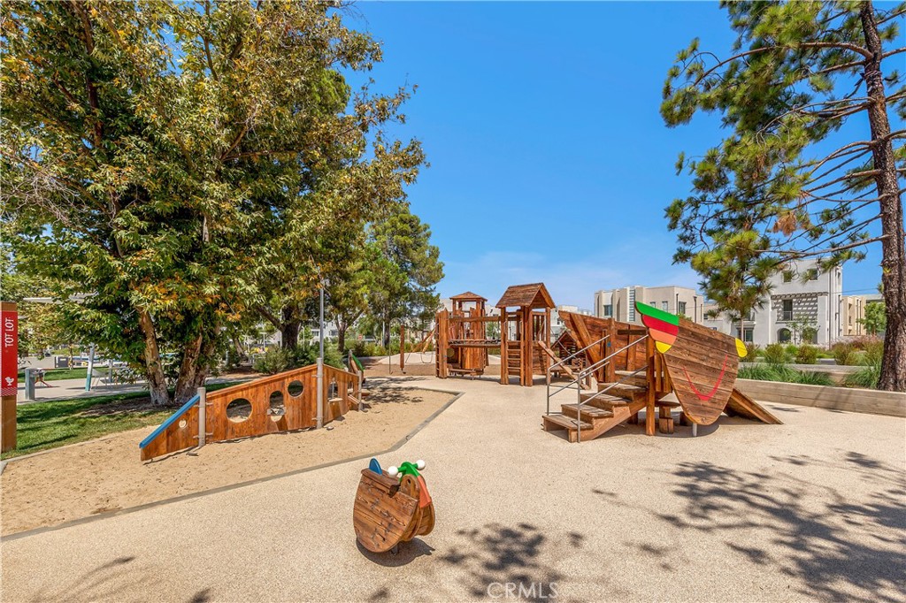 112 Menkar Irvine, CA 92618 - Photo 52 of 54 a view of a park with swings and slides