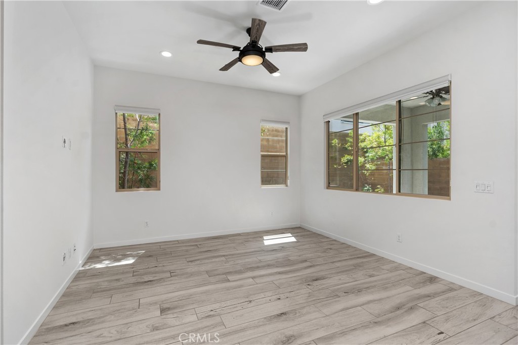 112 Menkar Irvine, CA 92618 - Photo 6 of 54 wooden floor in an empty room with a window