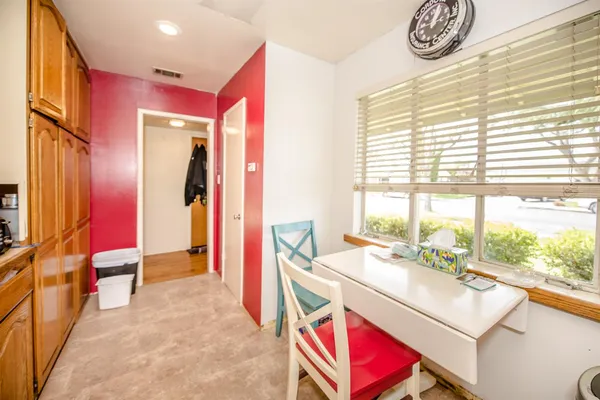 a room with furniture and a window