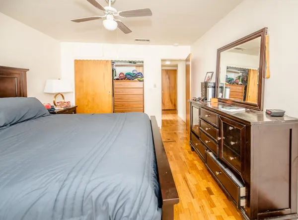 a bed room with a bed and a window