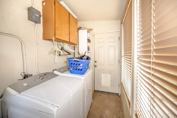 a en suite bathroom with a sink and mirror