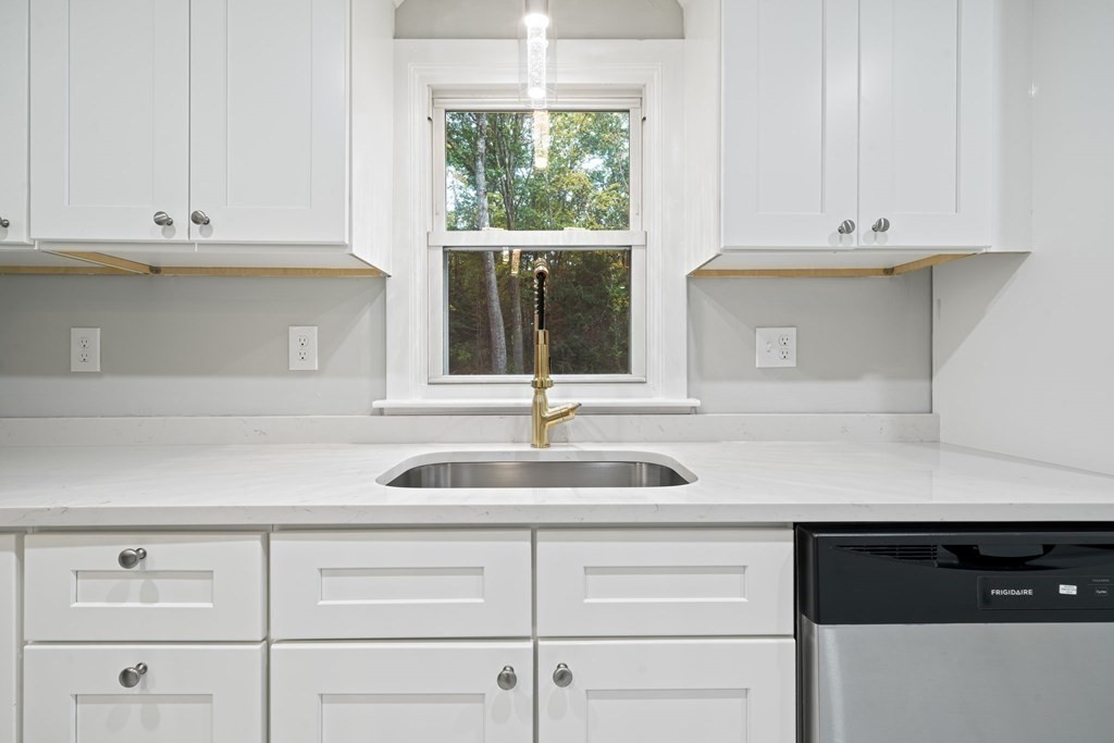 6 Ralph Road Princeton, MA 01541 - Photo 5 of 33 a kitchen with granite countertop white cabinets and a sink