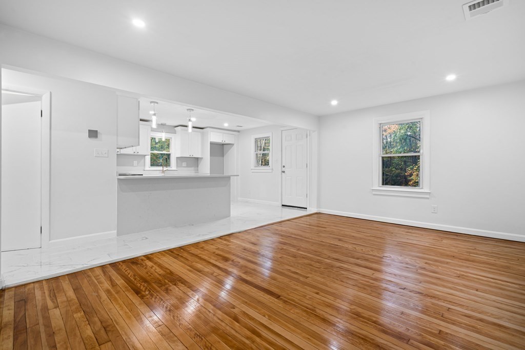 6 Ralph Road Princeton, MA 01541 - Photo 10 of 33 a view of empty room with wooden floor and fan