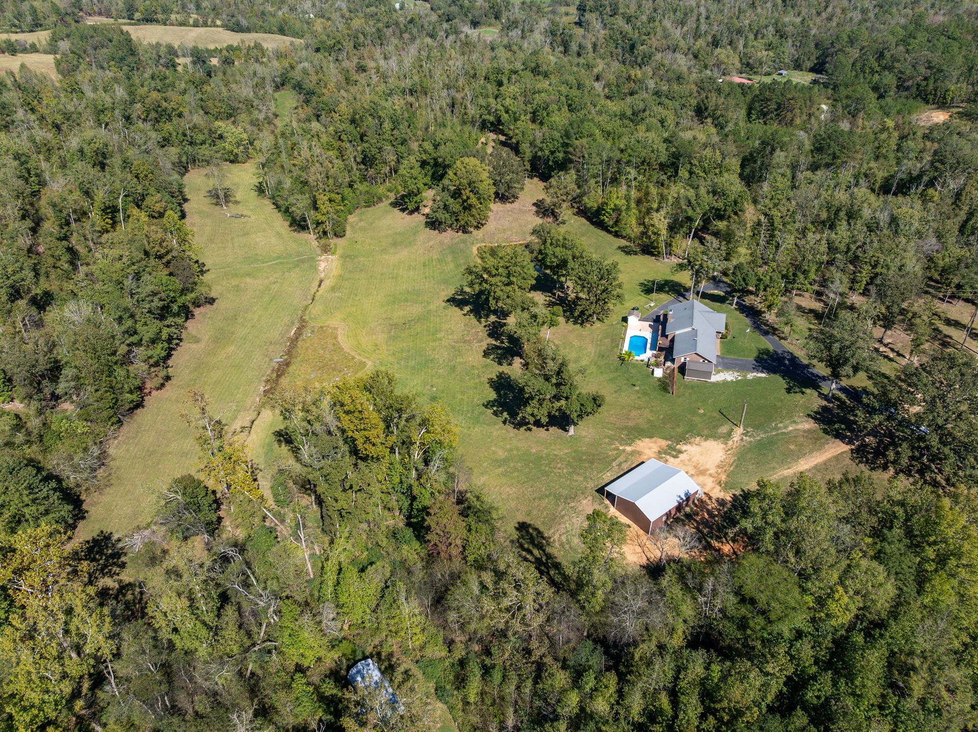 2743 Mouse Tail Road Parsons, TN 38363 - Photo 2 of 79 an aerial view of a house with a yard