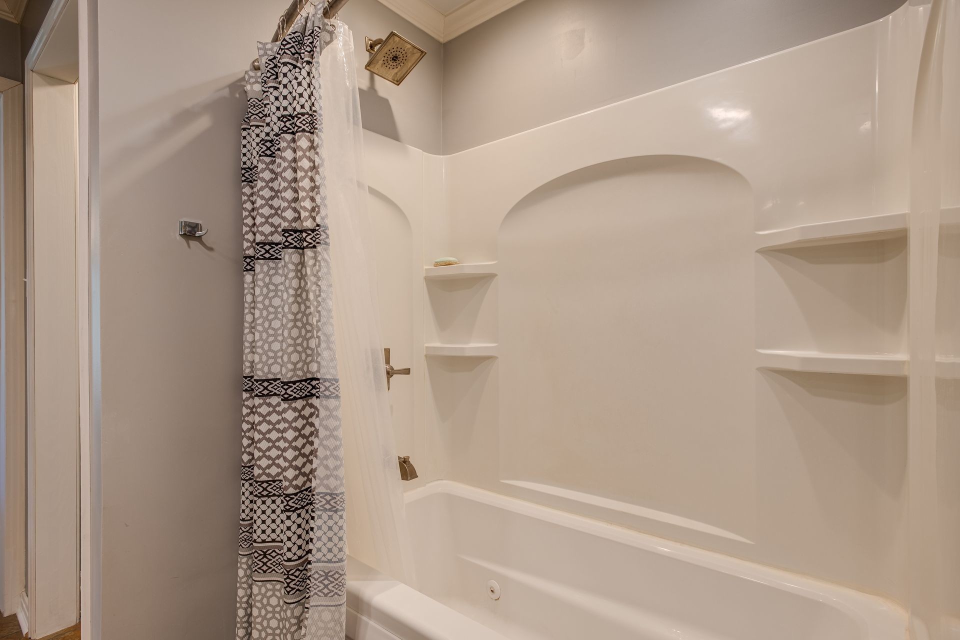 2743 Mouse Tail Road Parsons, TN 38363 - Photo 21 of 79 a bathroom with a bathtub and shower