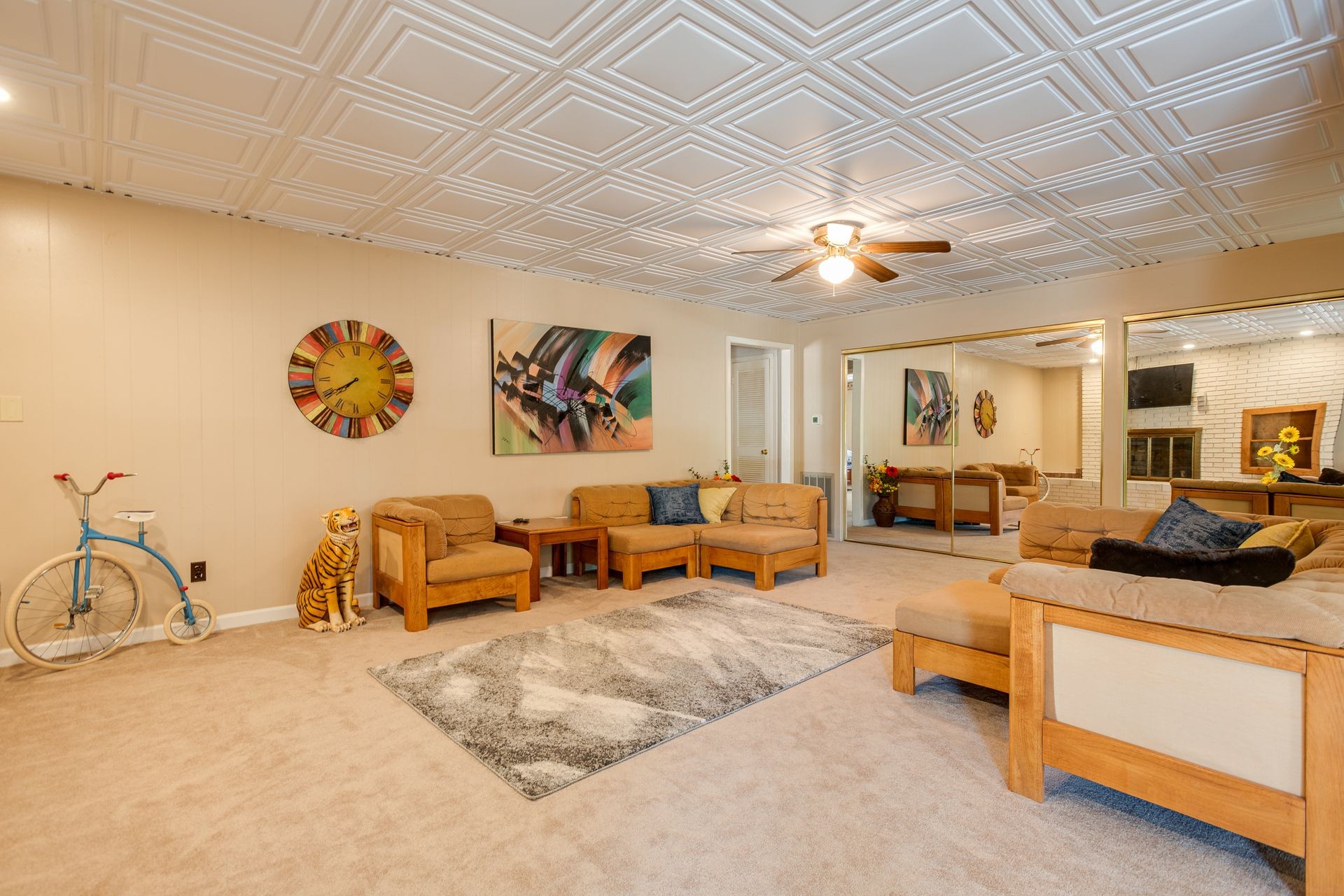 2743 Mouse Tail Road Parsons, TN 38363 - Photo 33 of 79 a living room with furniture gym equipment and a chandelier