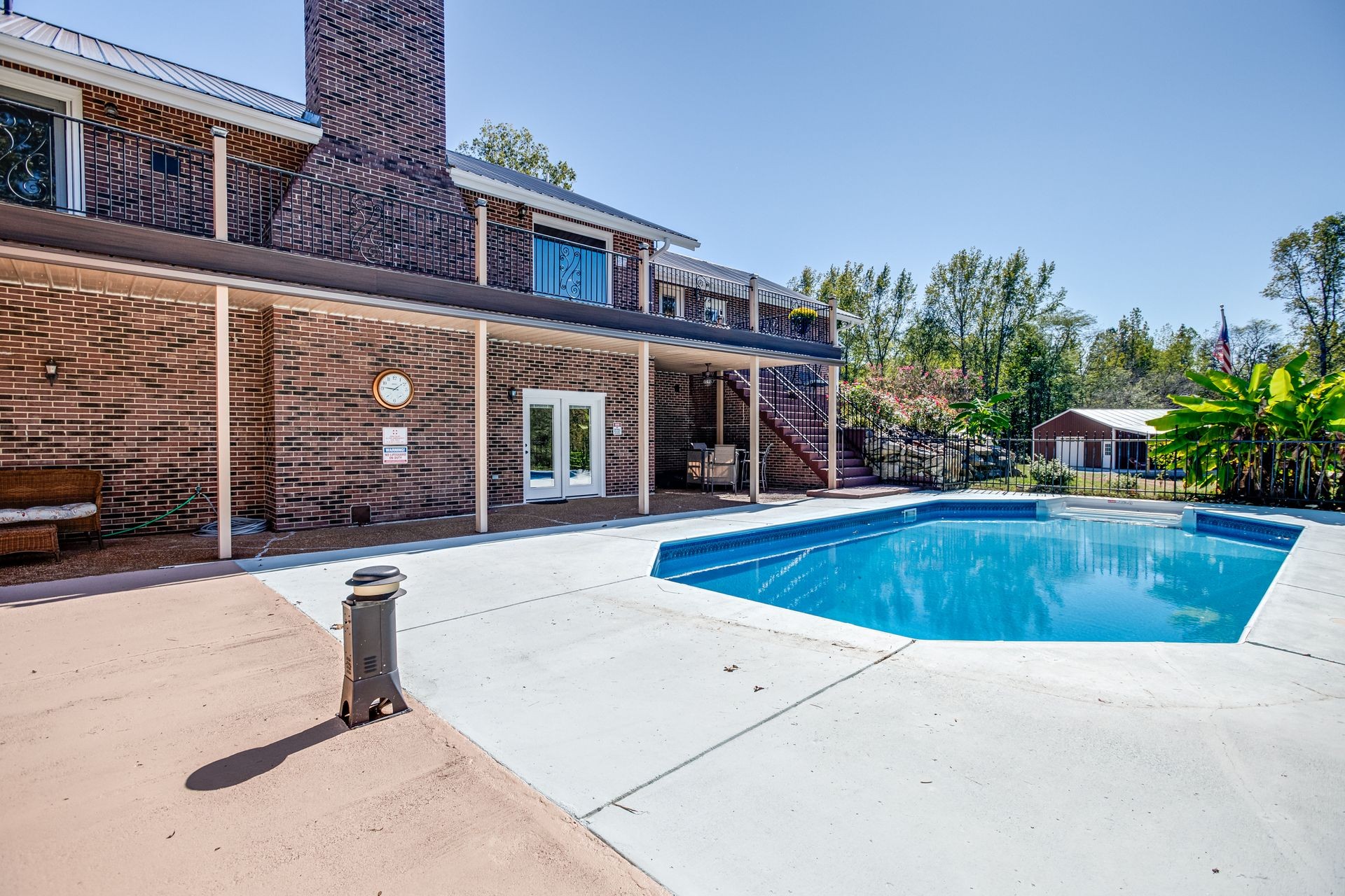2743 Mouse Tail Road Parsons, TN 38363 - Photo 45 of 79 front view of a house with swimming pool
