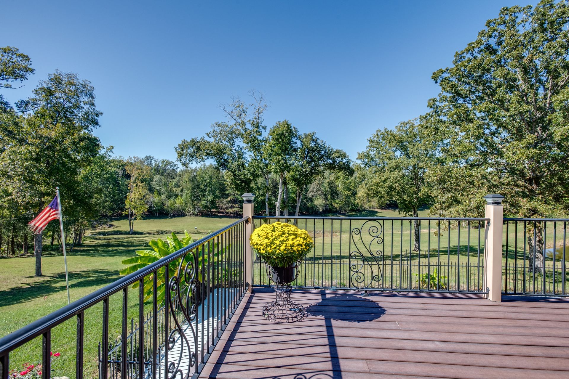 2743 Mouse Tail Road Parsons, TN 38363 - Photo 47 of 79 a view of a balcony with wooden floor and fence