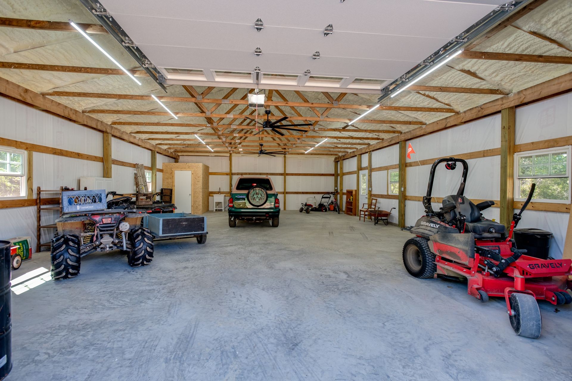 2743 Mouse Tail Road Parsons, TN 38363 - Photo 57 of 79 a view of parking garage with cars