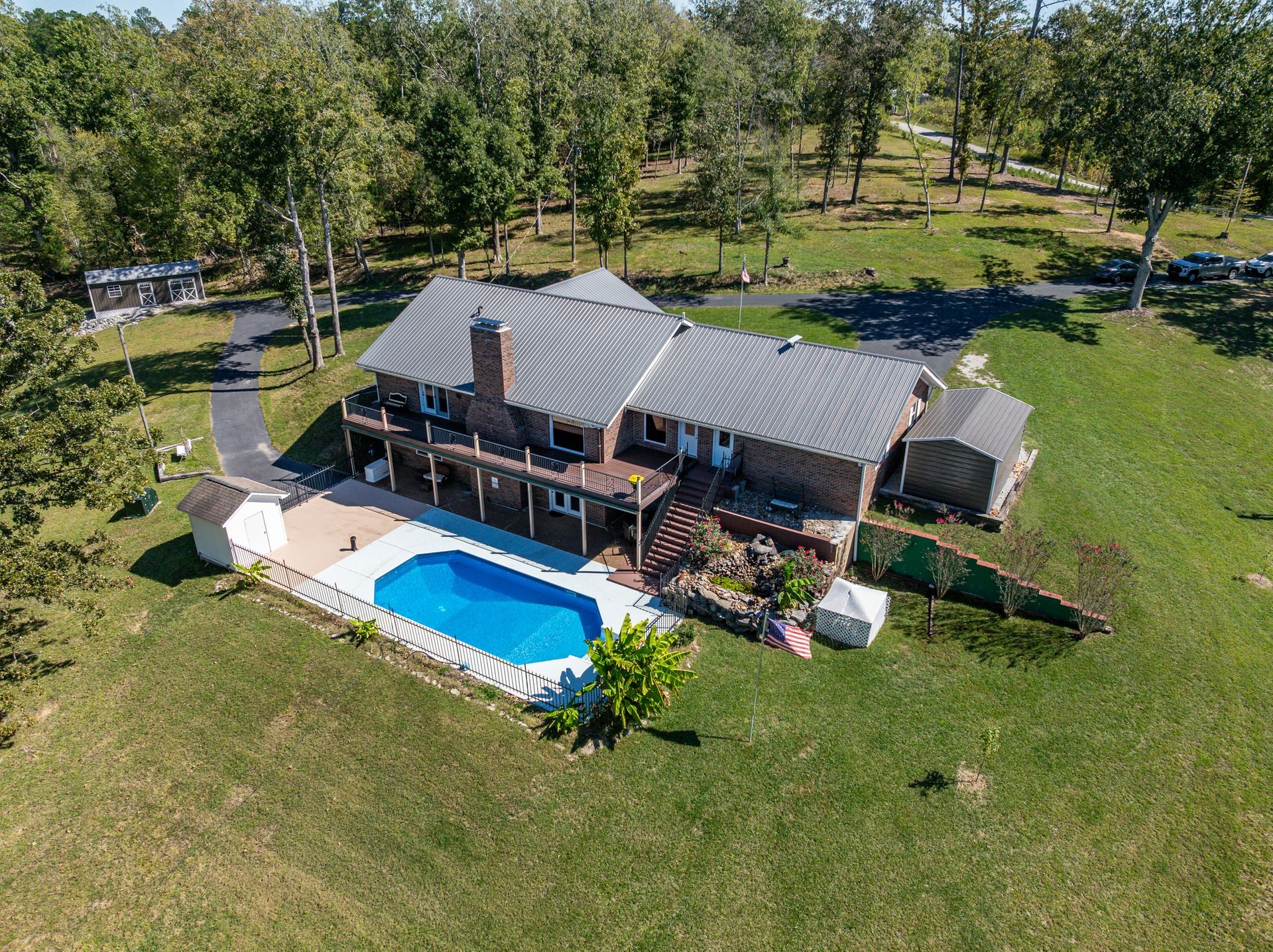 2743 Mouse Tail Road Parsons, TN 38363 - Photo 60 of 79 an aerial view of a house with swimming pool patio and outdoor seating