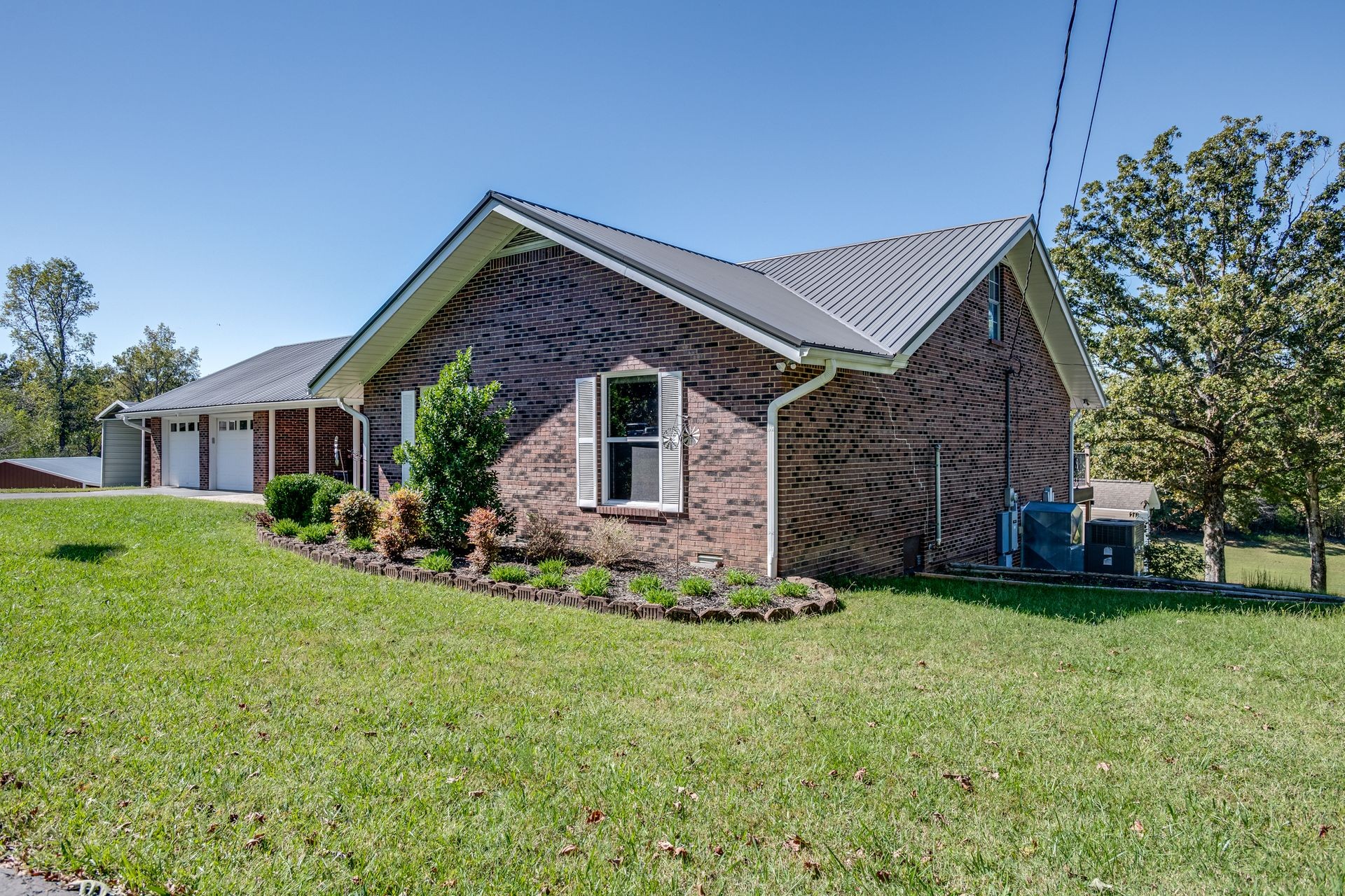 2743 Mouse Tail Road Parsons, TN 38363 - Photo 72 of 79 a front view of a house with a yard