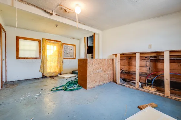 an empty room with windows