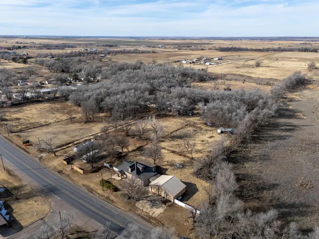 an aerial view of beach and ocean