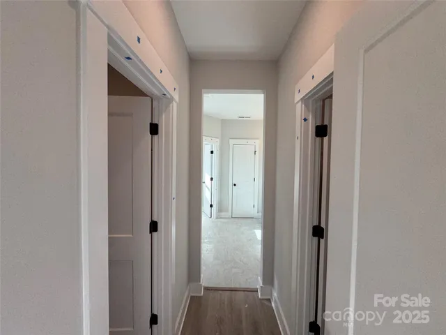 a bathroom with a shower and mirror