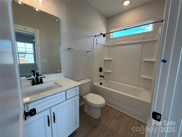 a view of a backyard of the house