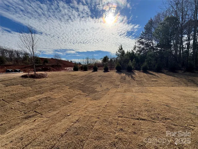 a view of house with outdoor space and seating area